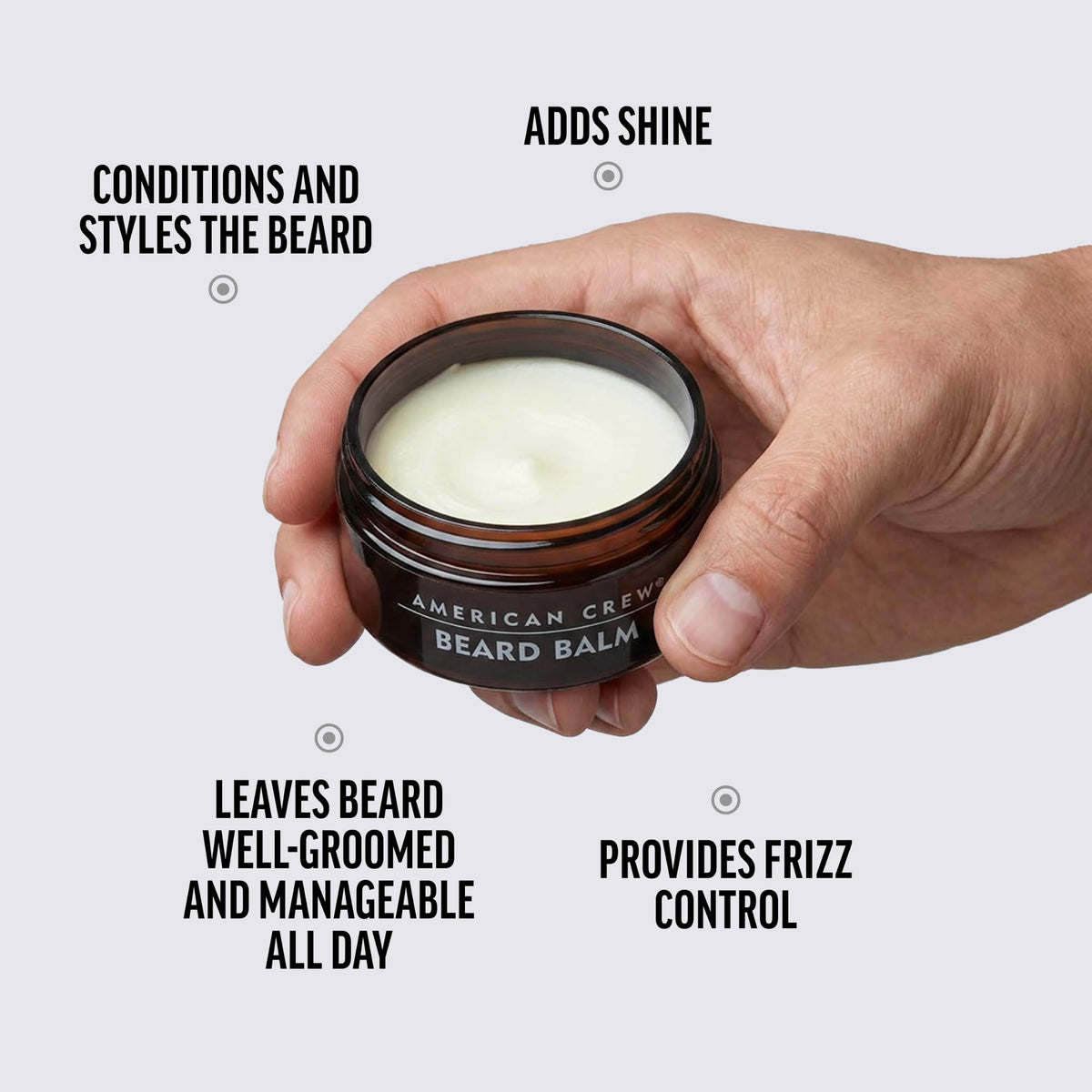 American Crew balm warmed on palms for even application and easy distribution