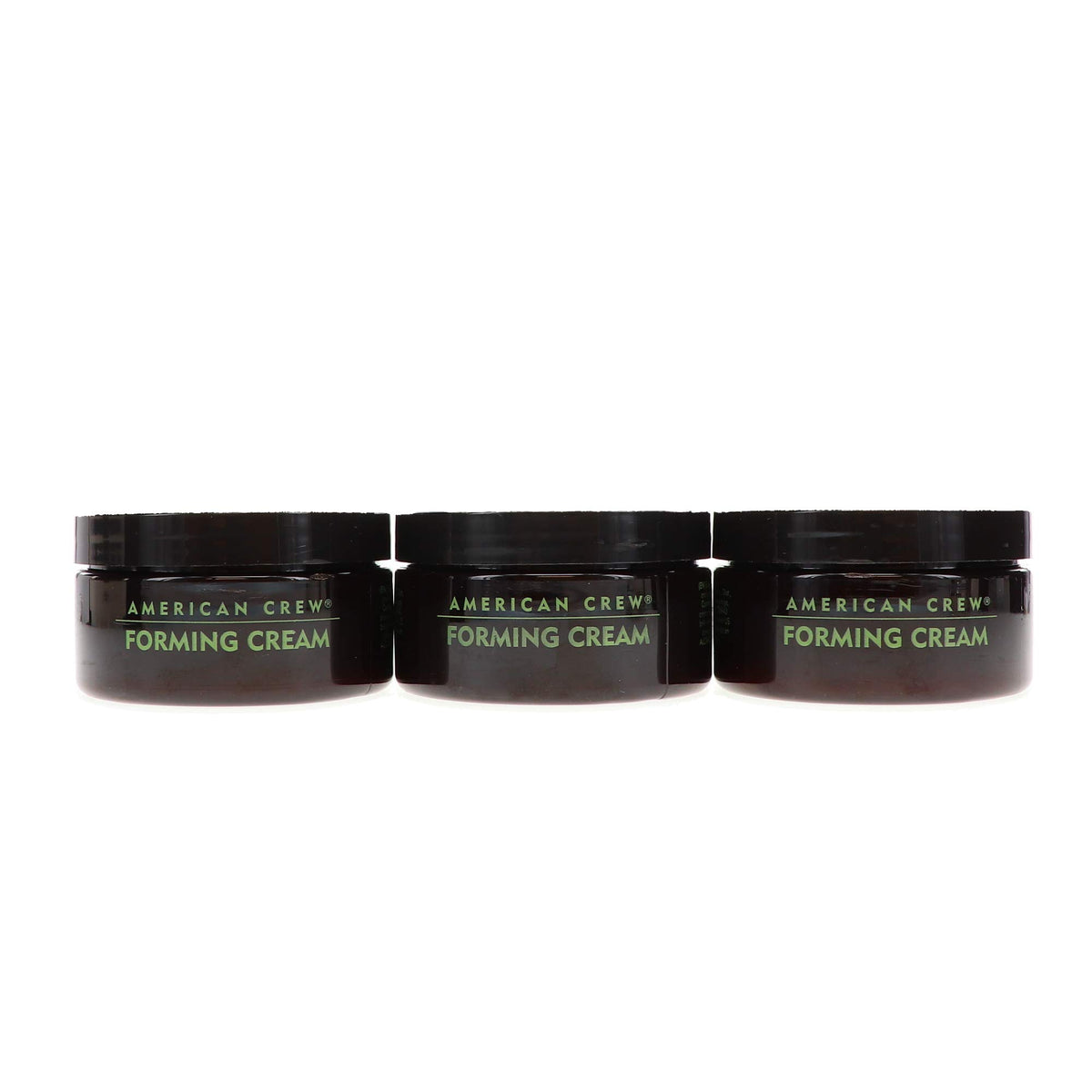 American Crew forming cream being applied to hair demonstrating control and natural finish