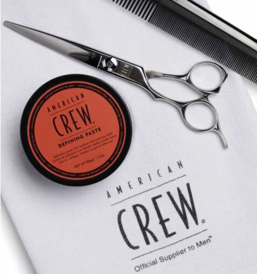 American Crew paste on hand demonstrating easy distribution and workable control