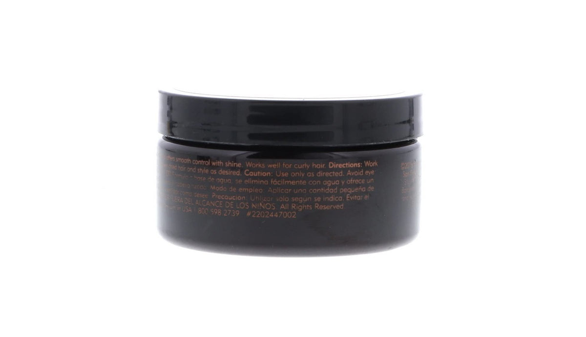 American Crew pomade on bathroom shelf in everyday grooming setting
