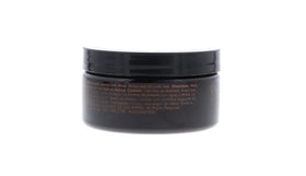 American Crew pomade on bathroom shelf in everyday grooming setting