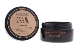 American Crew pomade open jar close-up showing creamy texture and easy spreadability