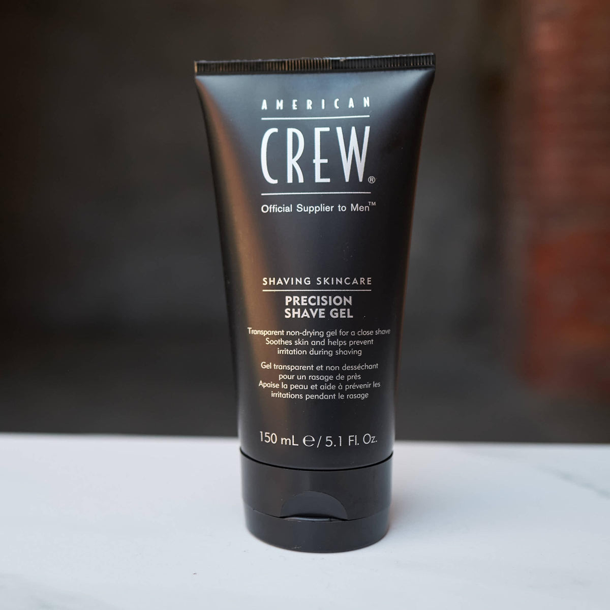 American Crew gel applied to beard demonstrating precise shaving visibility benefit