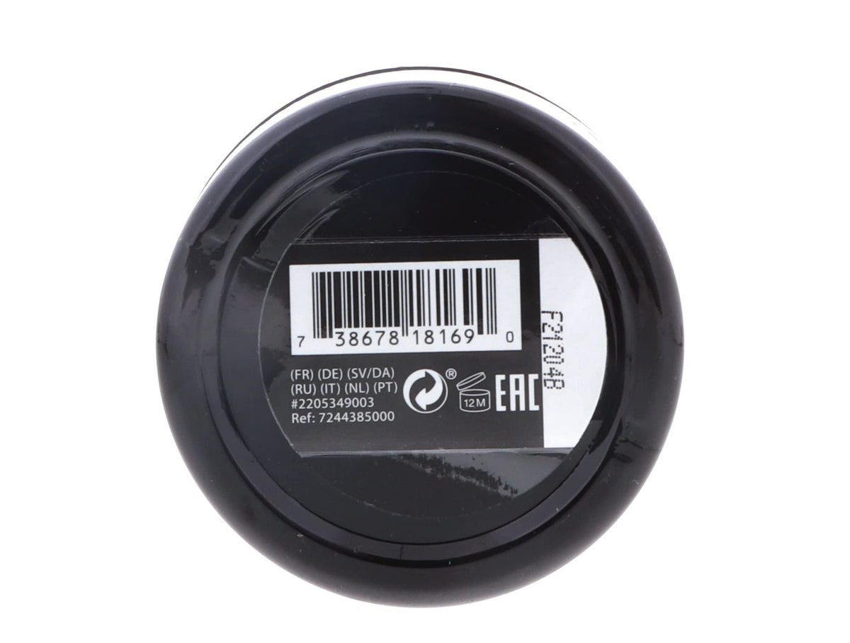 American Crew 3 oz jar held next to a hand for scale showing compact travel-friendly size