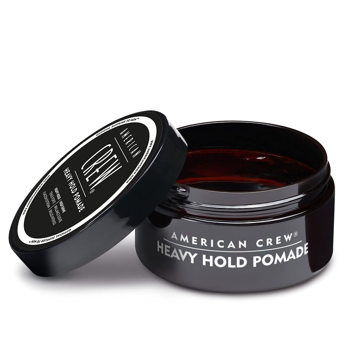 American Crew rinsing out pomade under tap showing easy washout benefit