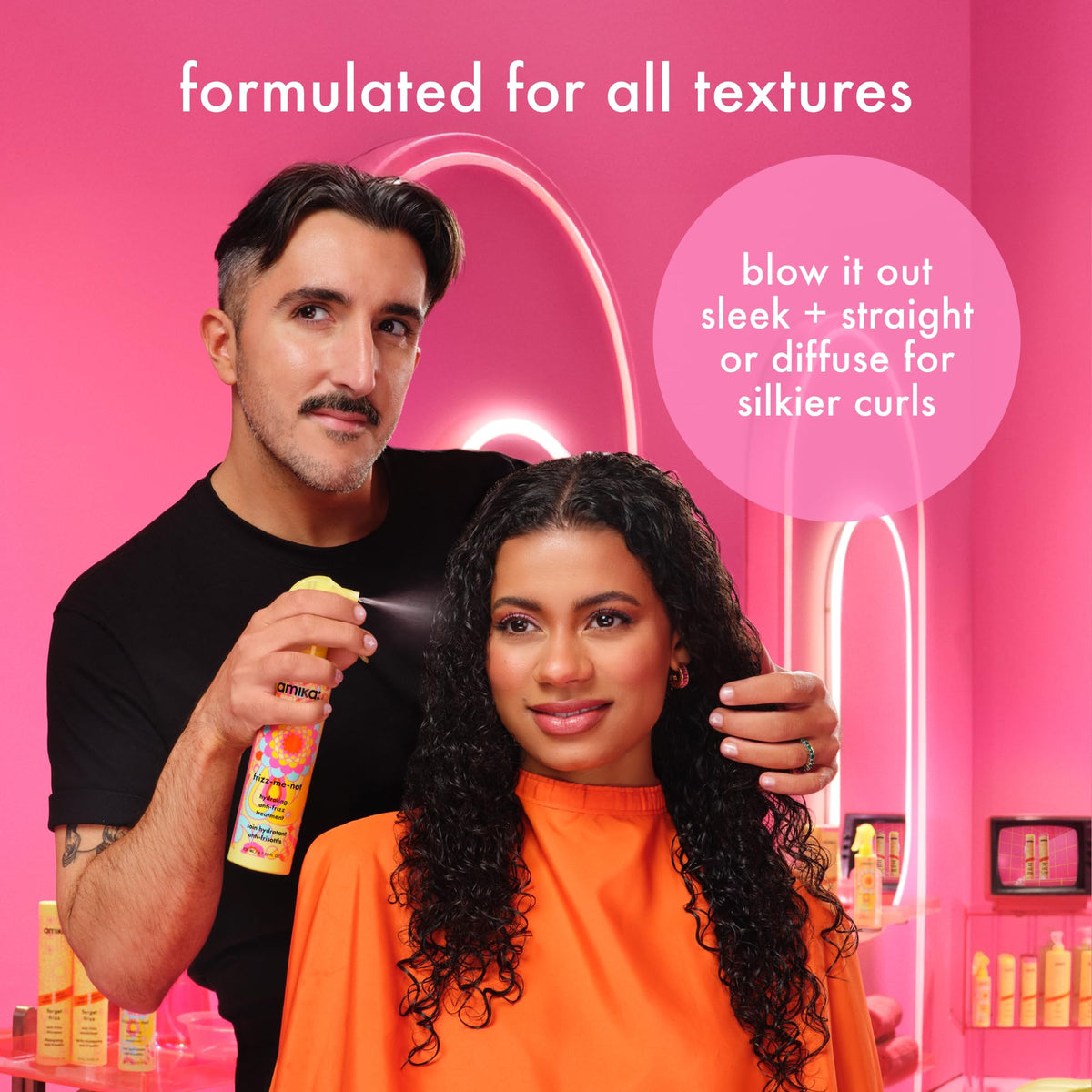 amika bottle next to brush and dryer illustrating styling routine compatibility
