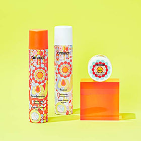 amika headstrong in hand for scale showing travel-friendly size and control