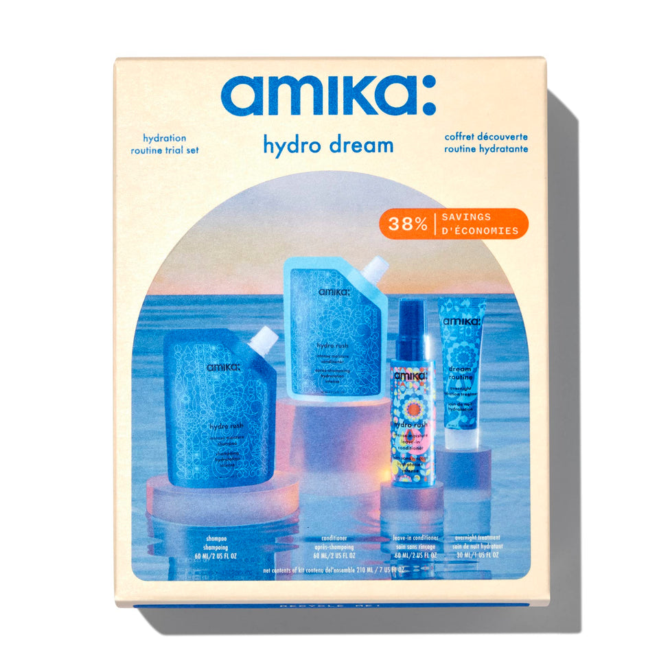Amika front packaging of trial set showing four travel bottles and compact box, convenient sample kit