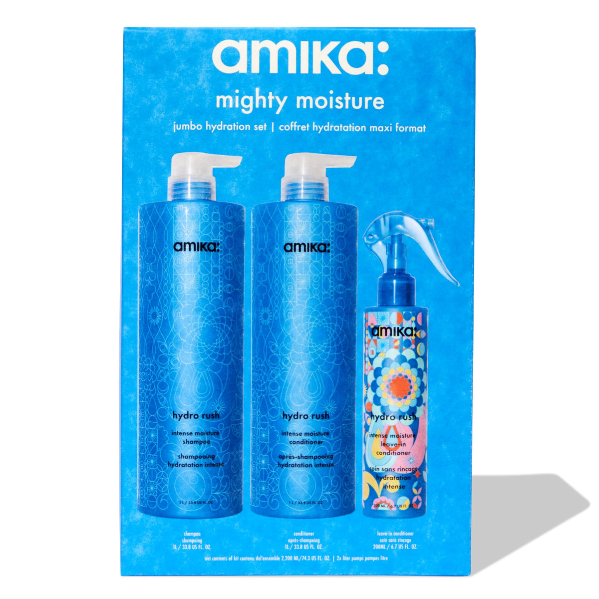 Amika leave-in sprayed through hair mid-lengths demonstrating detangling benefit