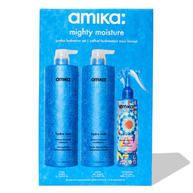 Amika leave-in sprayed through hair mid-lengths demonstrating detangling benefit