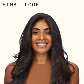 amika applying mousse to damp hair for immediate lift