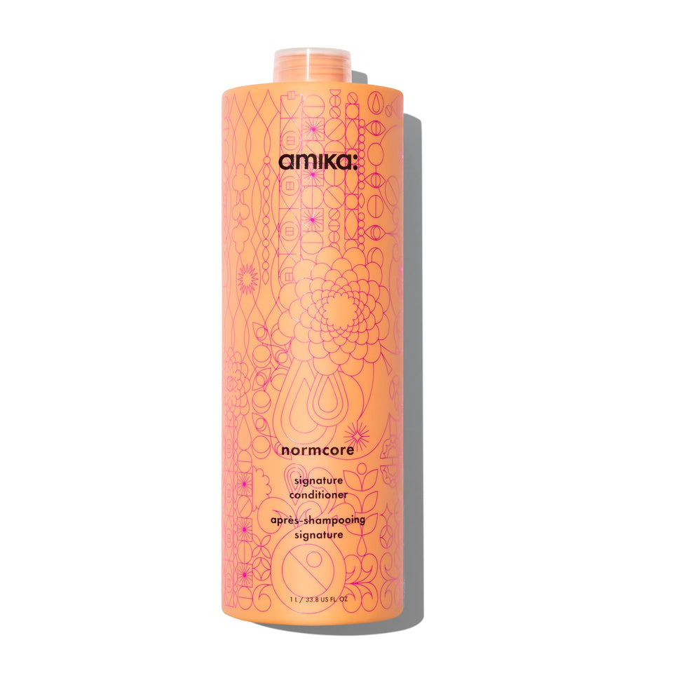 Amika Normcore front bottle showing large 1000ml size and easy storage benefit