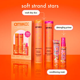 Amika Normcore Signature Shampoo bottle label closeup highlighting vitamins and antioxidant benefits