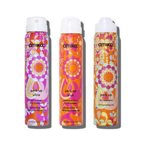 Amika front packaging showing three trial dry shampoo cans and clear benefit