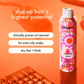 Amika aerosol nozzle close-up demonstrating even spray control