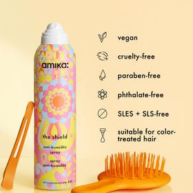 amika bottle in hand for size reference and travel convenience