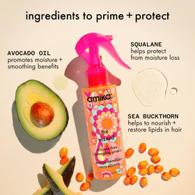 Amika spray droplet on fingertip showing lightweight texture benefit