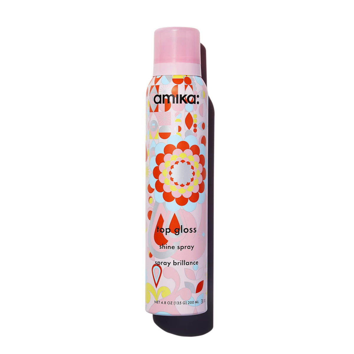 Amika top gloss front bottle view showing label and glossy finish benefit