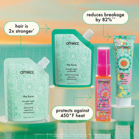 Amika Wizard silicone-free primer spray in hand for easy detangling
