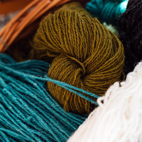 AMOZA cotton sliver stretched to show 13 feet continuous length for longer projects