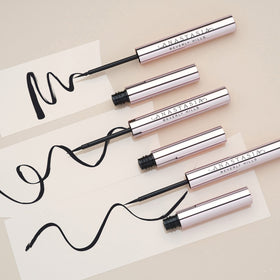 Anastasia Beverly Hills liner beside a ruler showing tip scale and portability