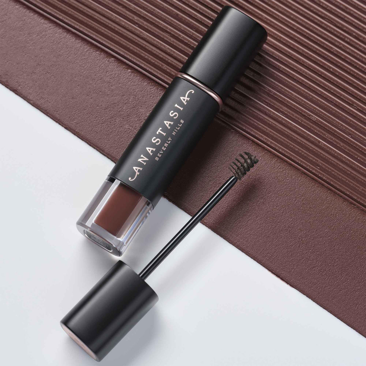 Anastasia Beverly Hills mini gel tucked inside travel bag for easy touch-ups