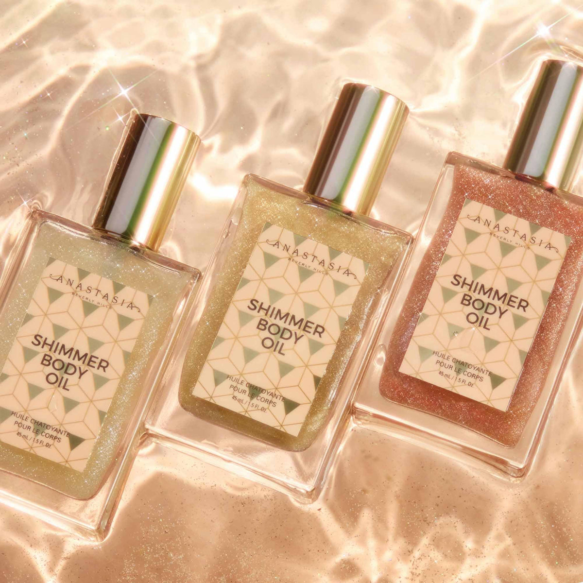 Anastasia Beverly Hills bottle staged on beach towel conveying coconut-vanilla scent mood