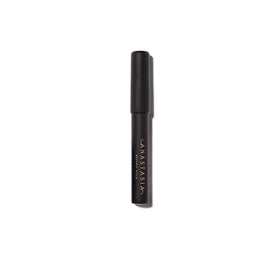 Anastasia Beverly Hills brow primer being applied close-up to lift hairs and improve hold