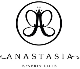 Anastasia Beverly Hills Brush 12 beside common items showing compact, travel-friendly size