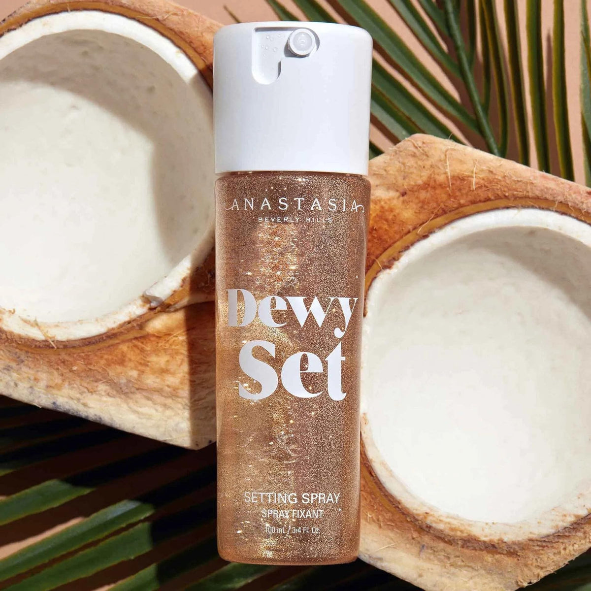 Anastasia Beverly Hills Dewy Set fine mist close-up demonstrating even atomizer spray for smooth, weightless application