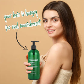 AnatoliaDaphne ingredients flat lay with argan, peppermint and biotin benefits