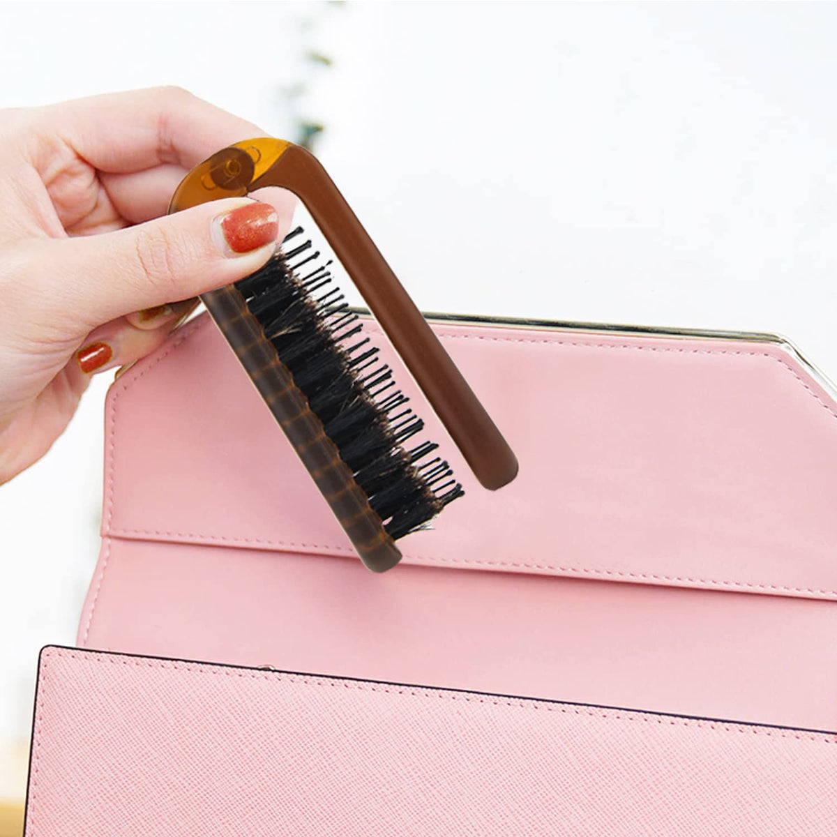 Ancable brushing wet hair gently to detangle and smooth