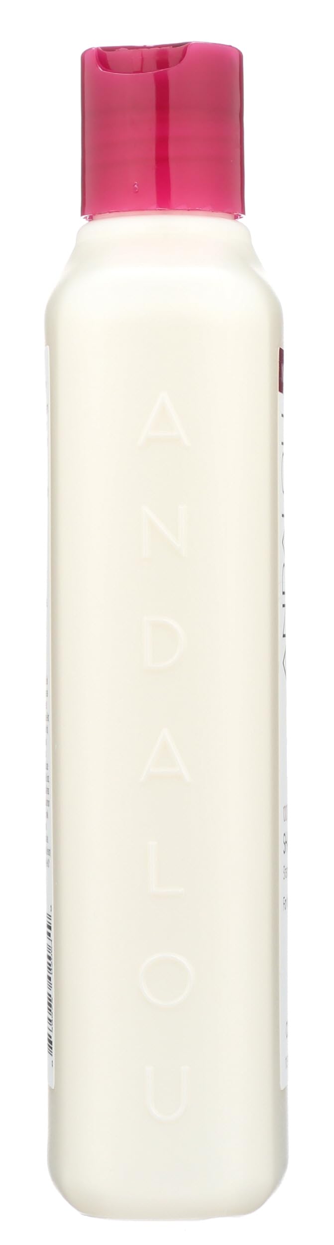Andalou Naturals 11.5 fl oz bottle beside a tape measure showing size perspective