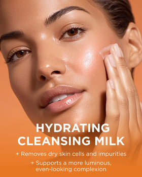 Andalou Naturals creamy cleanser dispensed on hand for soft lather