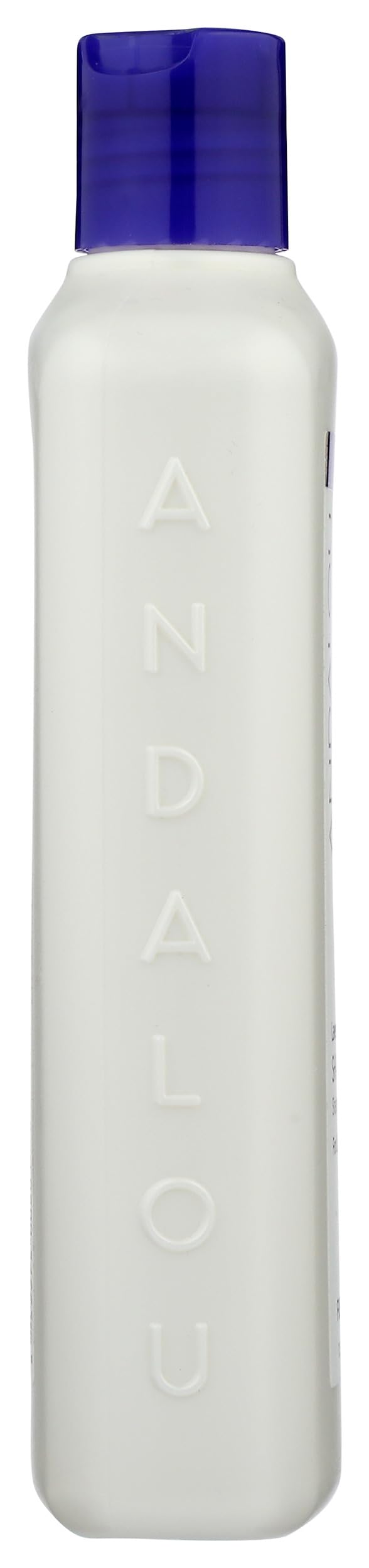 Andalou Naturals shampoo poured on hair strand showing lightweight coating