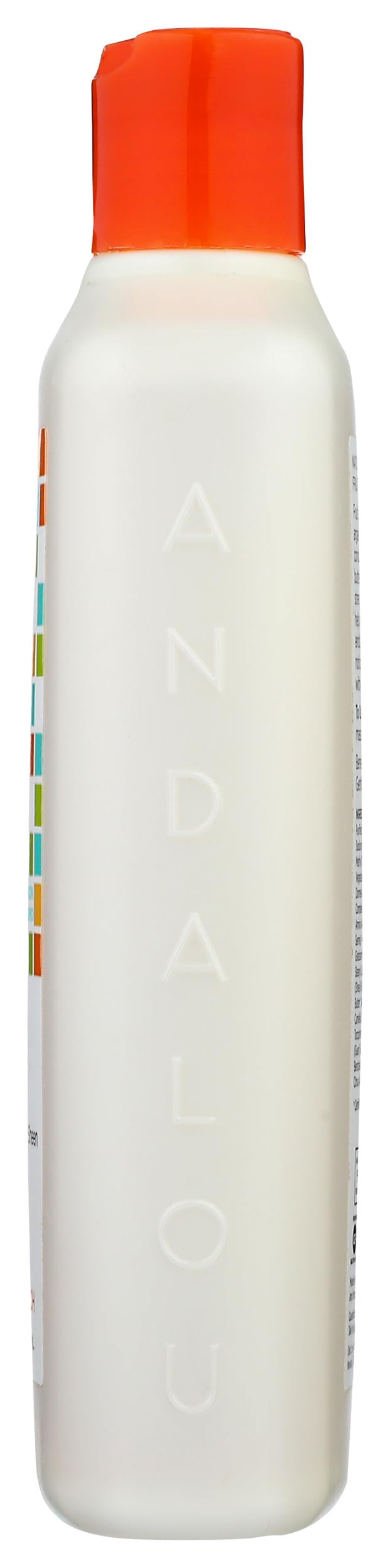 Andalou Naturals 11.5 ounce bottle next to common items for scale