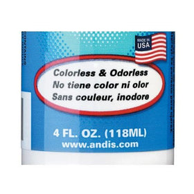 Andis brand oil being applied to clipper blade to reduce friction