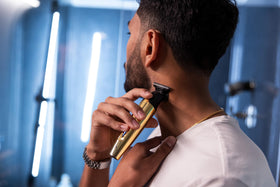 Andis Insight with four attachment combs showing styling length options and versatility