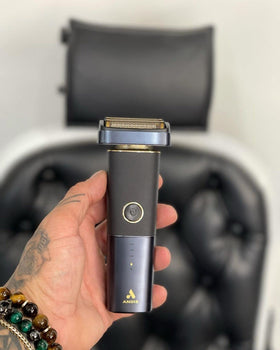 Andis reSURGE shaving with lather demonstrating wet/dry convenience
