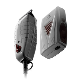Andis shaver in hand demonstrating lightweight cordless use and ergonomic control