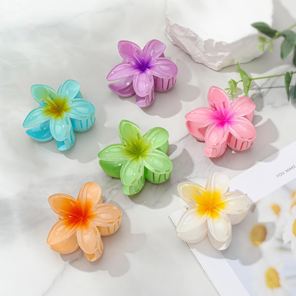 ANEESAA flower clip securing thick hair for confident, comfortable hold