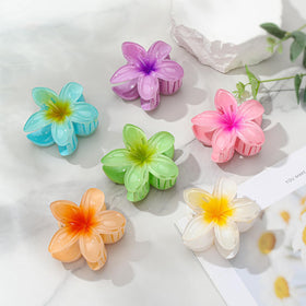 ANEESAA flower clip securing thick hair for confident, comfortable hold