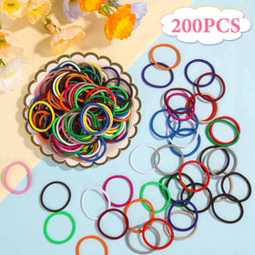 Anezus hair ties in hand for size comparison showing compact portable benefit