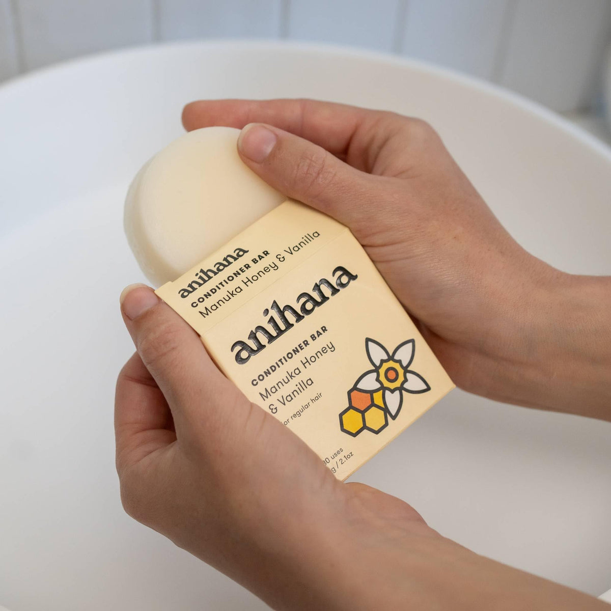ANIHANA lather on palms demonstrating concentrated conditioning power