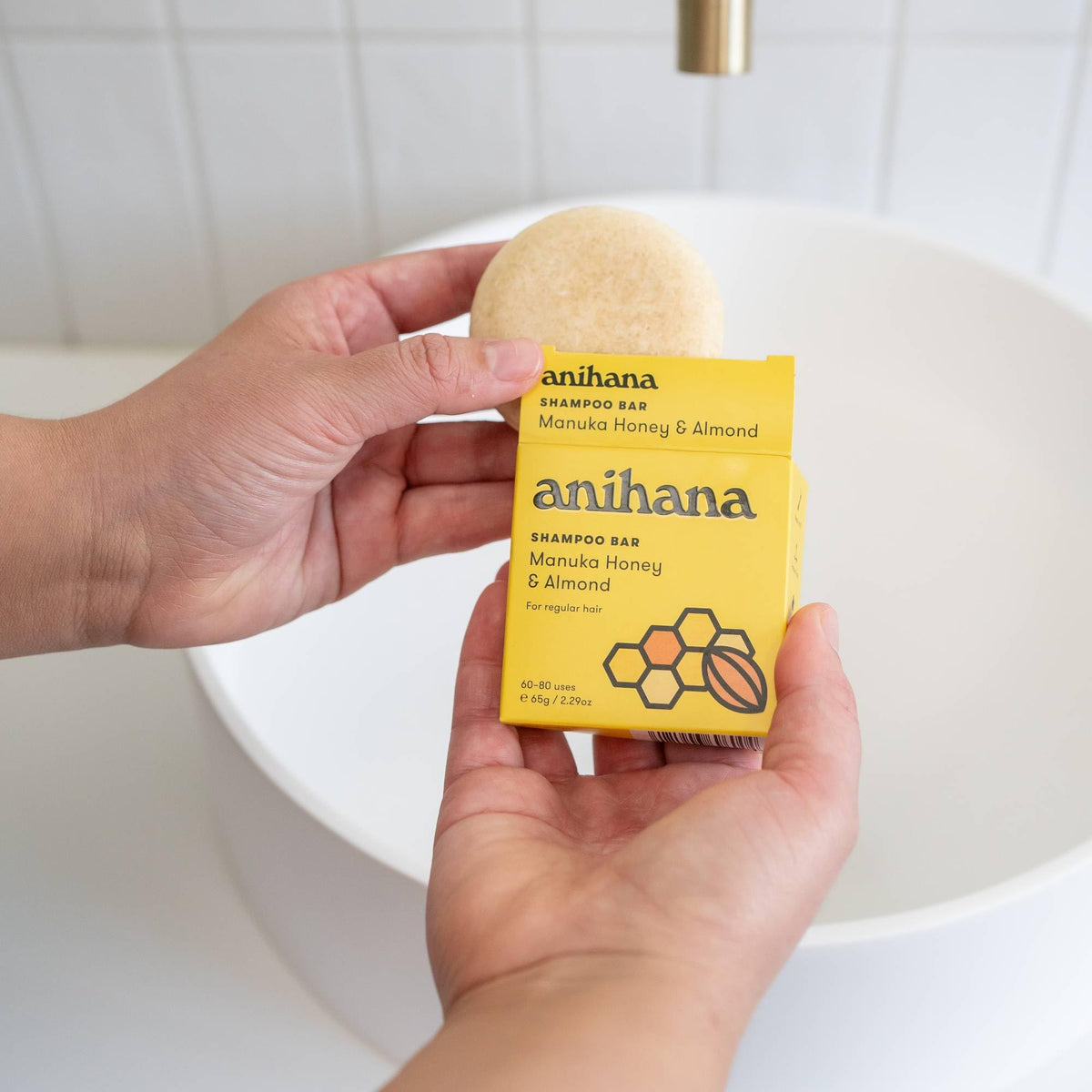 ANIHANA bar beside standard shampoo bottle for lasting-per-bar comparison