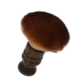 Anself neck duster held in hand to show size and easy maneuverability during styling