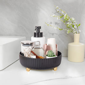 Anyoifax in-use on vanity with perfumes and lotions for faster routines