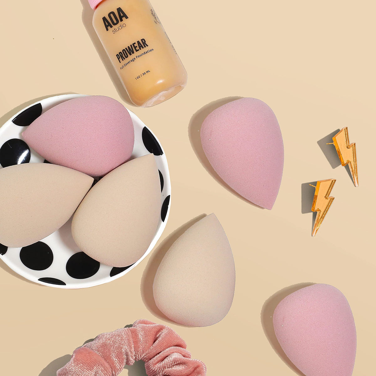 AOA STUDIO lifestyle vanity image showing sponges ready for everyday beauty routines