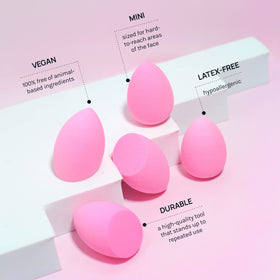 AOA STUDIO teardrop sponge in hand for precise contouring and control