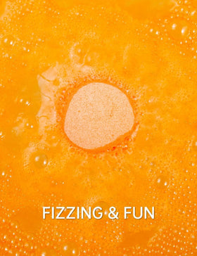 Aofmee fizzing in bathtub producing bubbles and releasing aroma during soak